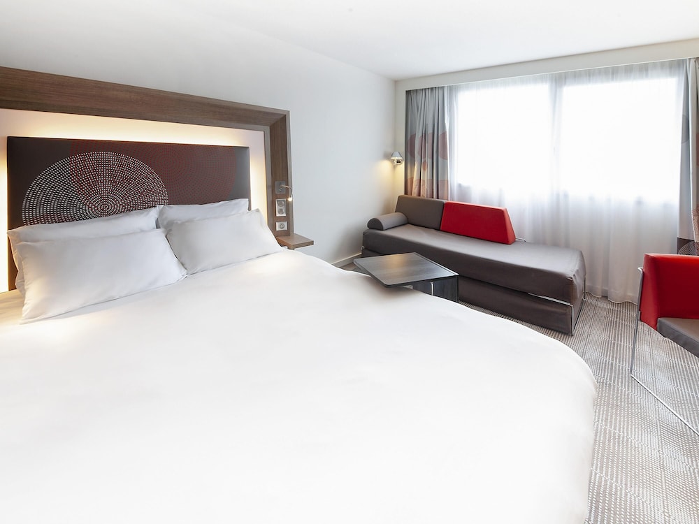Habitación Clásica con 1 cama doble y 2 camas extraíbles del hotel Novotel Clermont-Ferrand