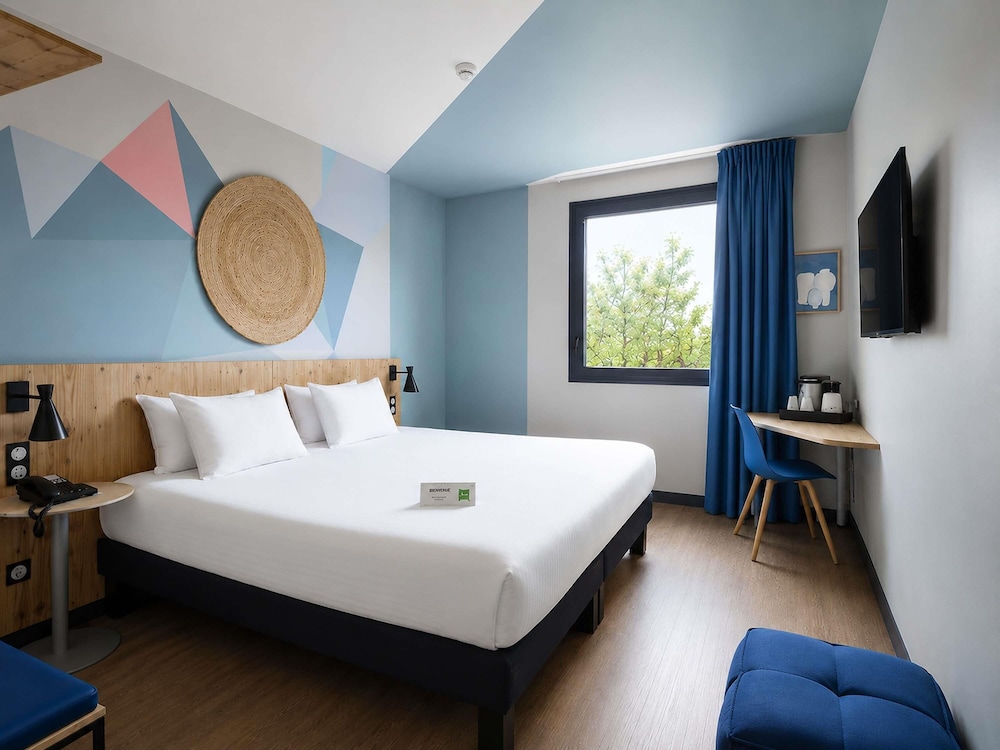 Habitación Superior del hotel ibis Styles Evry Lisses. Foto 1