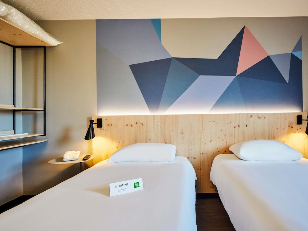 Habitación estándar con camas individuales del hotel ibis Styles Evry Lisses