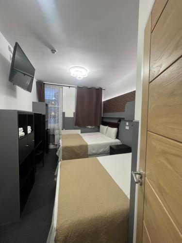Habitación Doble del hotel Plaza London. Foto 9