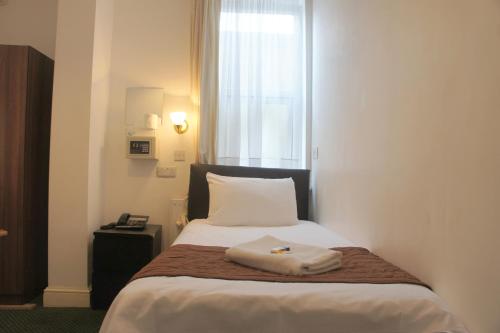 Habitación Individual con baño privado del hotel Plaza London. Foto 3