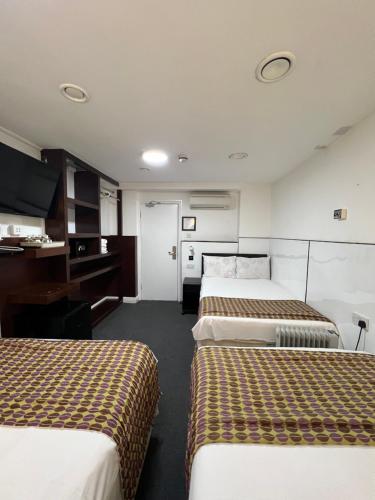 Habitación Familiar del hotel Plaza London. Foto 5