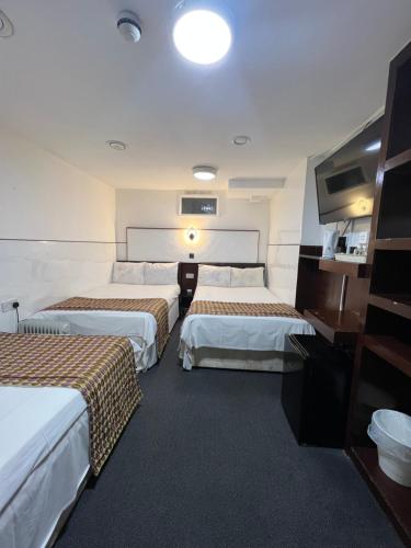 Habitación Familiar del hotel Plaza London. Foto 6