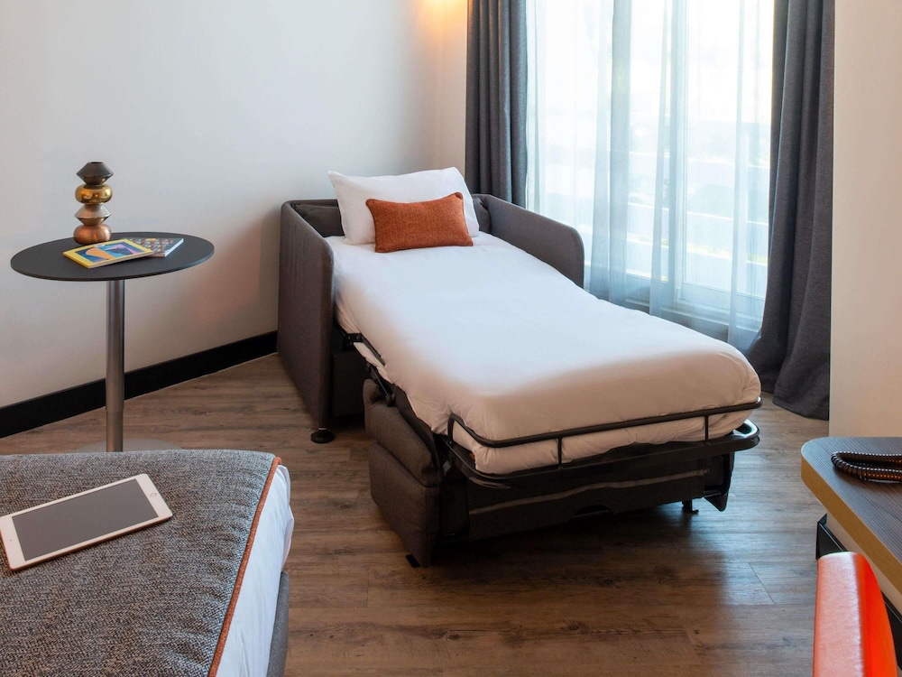 Habitación Executive - 1 cama doble y 1 sofá cama individual del hotel Novotel La Grande Motte Golf. Foto 7