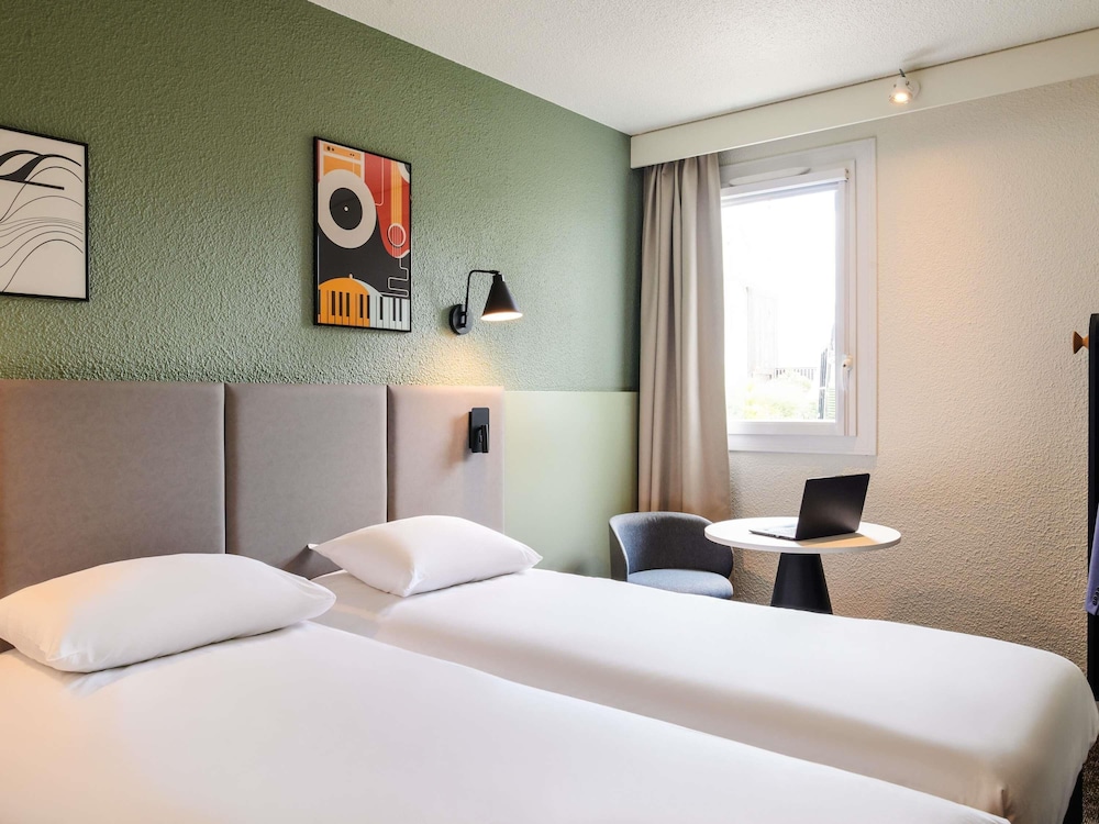 Habitación estándar con 2 camas individuales del hotel Ibis La Roche sur Yon