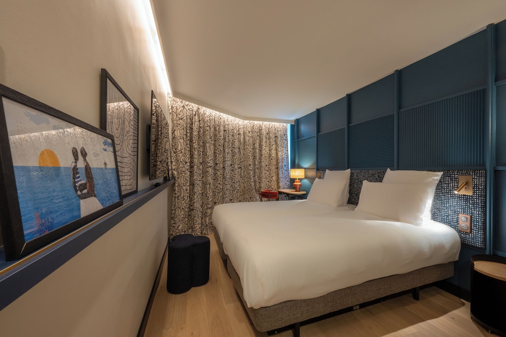 Habitación con dos camas individuales del hotel Mercure La Rochelle Vieux-port. Foto 1