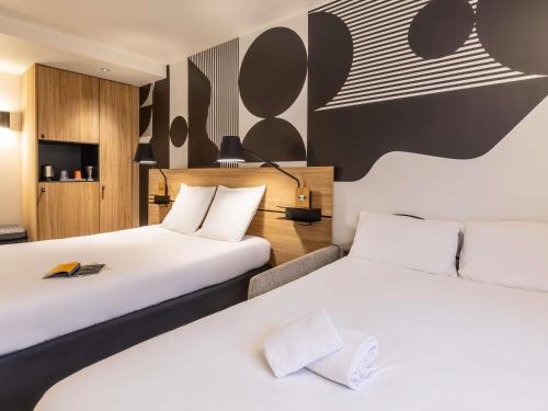 Habitación Doble Superior con sofá cama del hotel Mercure Metz Centre. Foto 3