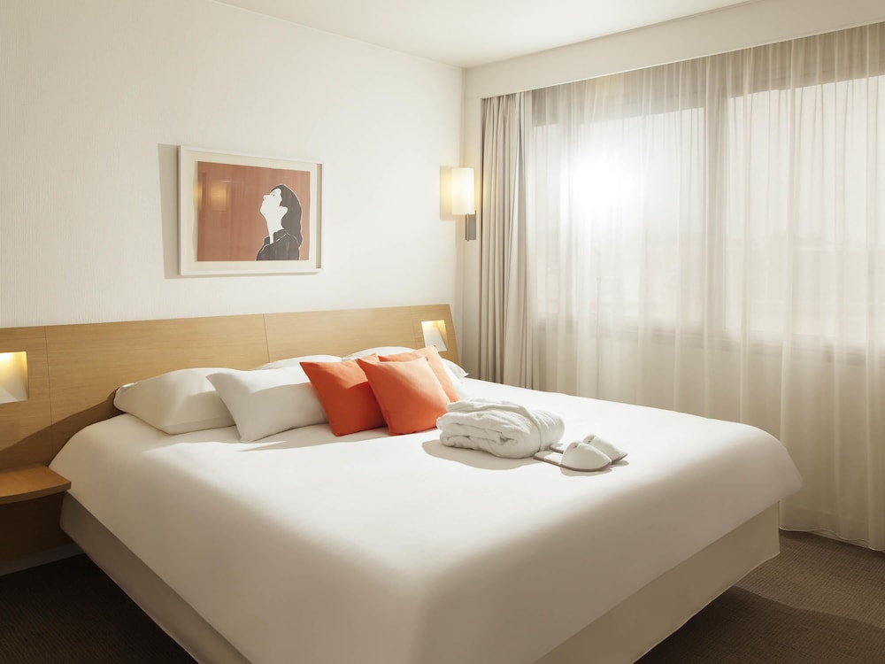 Habitación Superior con cama queen - size y sofá - cama doble del hotel Novotel Metz Centre