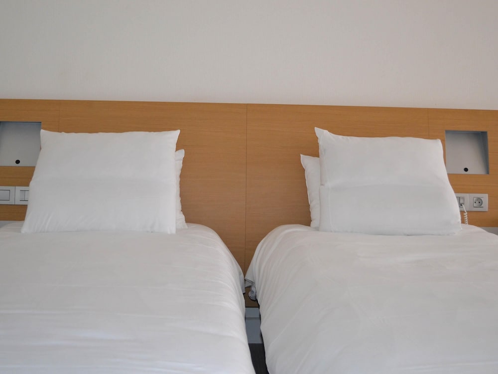 Habitación Superior con Dos Camas Individuales del hotel Novotel Metz Centre. Foto 4