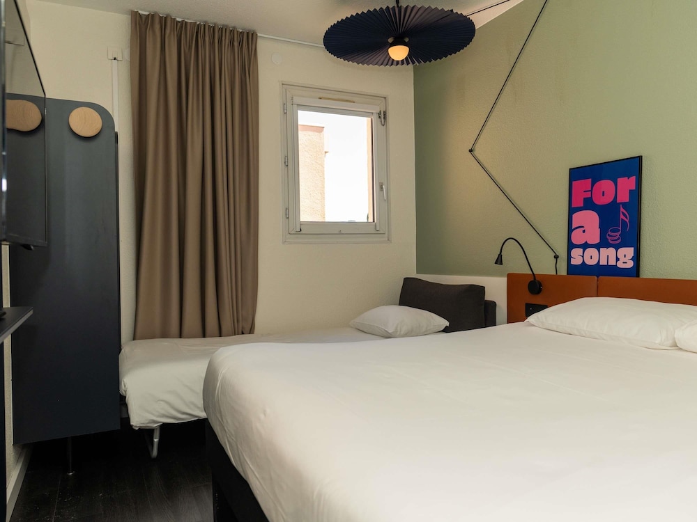 Habitación Estándar con 1 cama doble del hotel Ibis Orange Centre Échangeur A7 A9. Foto 15