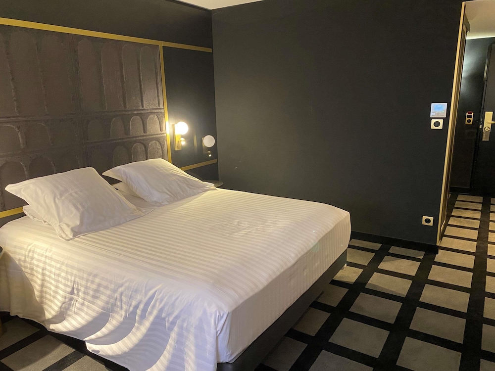 Habitación Clásica con balcón con vistas al río Loira del hotel Mercure Orléans Centre. Foto 1