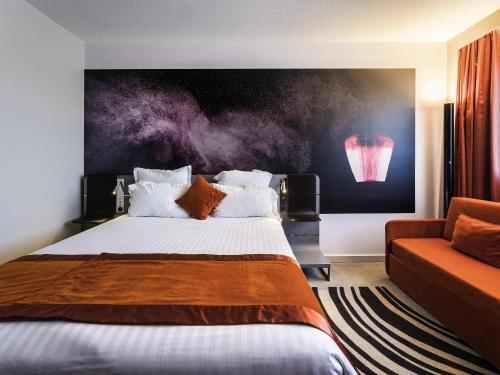 Habitación Clásica con 1 cama doble y 1 sofá - cama doble del hotel Novotel Orleans St Jean Braye. Foto 2