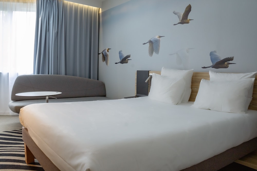Habitación Clásica - 1 cama doble y 1 sofá - cama individual del hotel Novotel Valence Sud. Foto 2