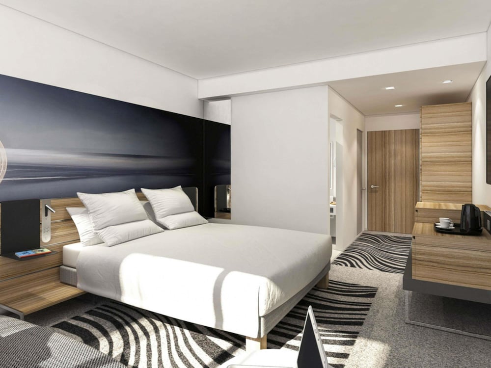 Habitación Clásica - 1 cama doble y 1 sofá - cama individual del hotel Novotel Valence Sud. Foto 9