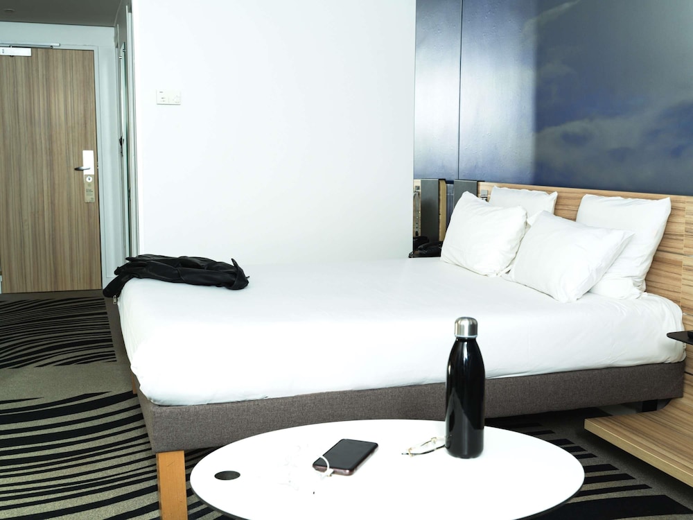 Habitación Clásica - 1 cama doble y 1 sofá - cama individual del hotel Novotel Valence Sud. Foto 11