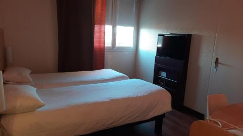 Habitación Doble Estándar - 2 camas del hotel Ibis Roanne. Foto 4