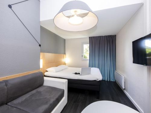 Habitación Estándar con 1 cama doble y 2 camas individuales del hotel Ibis Sisteron