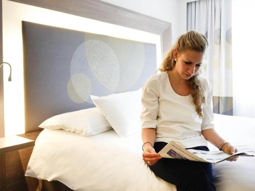 Suite con 1 cama doble del hotel Novotel Paris Saclay