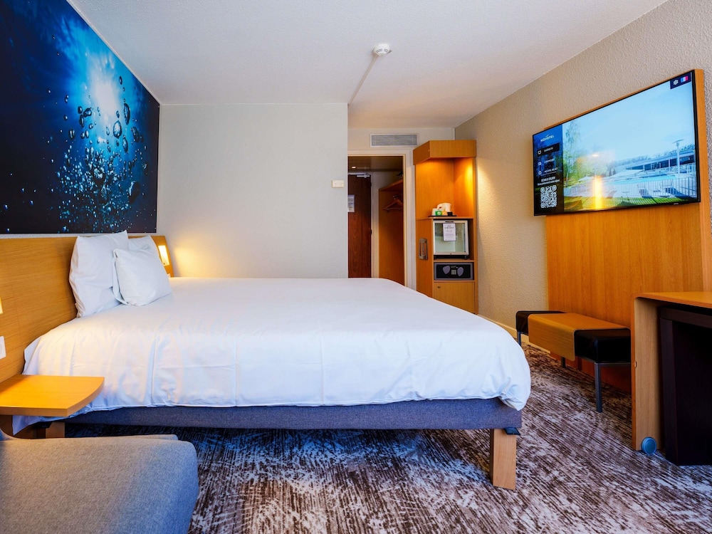 Habitación Clásica - 1 cama doble y 1 sofá - cama individual del hotel Novotel Saint Avold