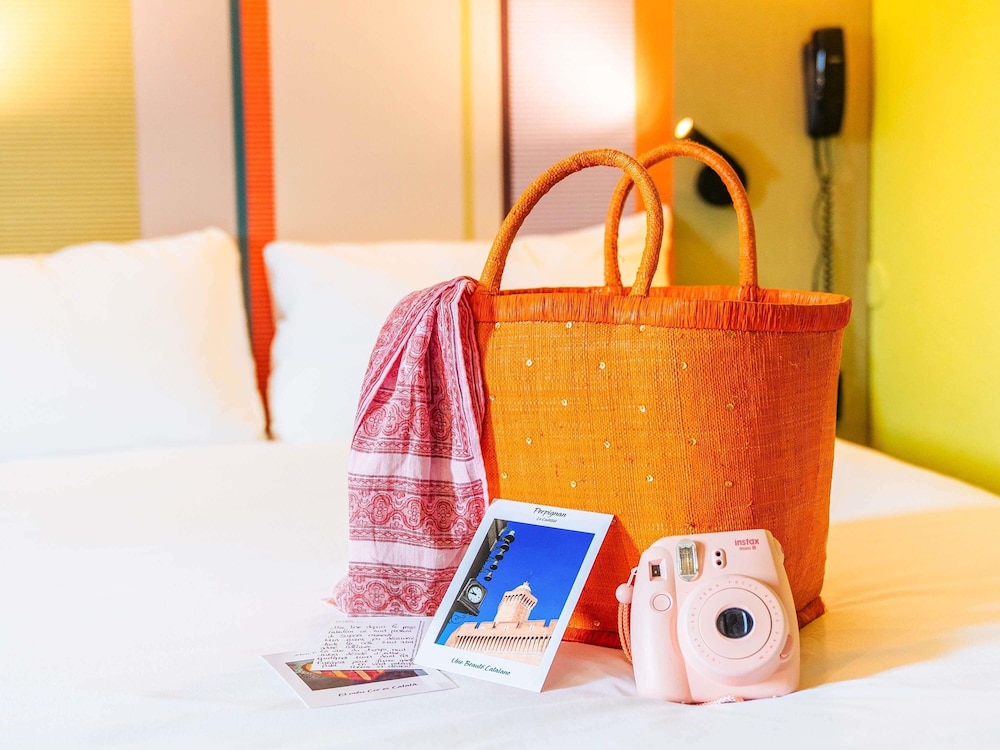 Habitación estándar con 2 camas individuales del hotel Ibis Styles Perpignan Centre Gare. Foto 1