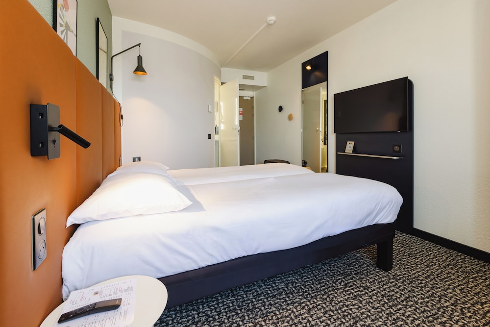 Habitación estándar con 2 camas individuales del hotel IBIS RENNES CENTRE GARE SUD. Foto 6