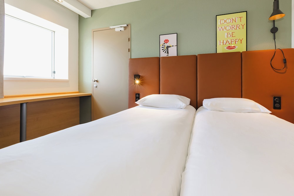 Habitación estándar con 2 camas individuales del hotel IBIS RENNES CENTRE GARE SUD. Foto 7