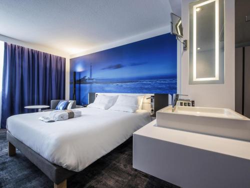 Habitación Ejecutiva con 1 cama queen size del hotel Novotel Rennes Alma