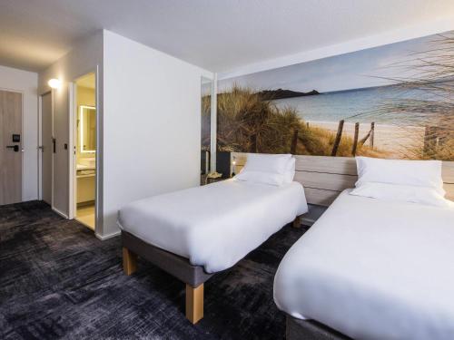 Habitación Clásica con 1 cama individual del hotel Novotel Rennes Alma. Foto 5