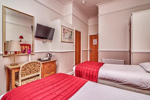 Habitación Triple Clásica del hotel Hyde Park Radnor. Foto 2