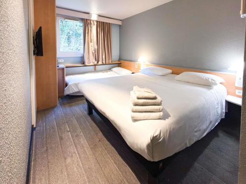 Habitación Estándar - 1 cama doble y 1 individual del hotel IBIS RENNES CESSON. Foto 4