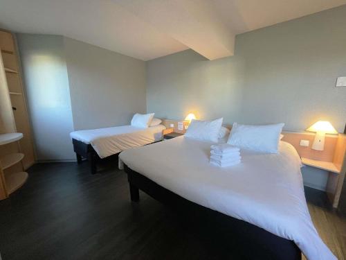 Habitación Estándar - 1 cama doble y 1 individual del hotel IBIS RENNES CESSON. Foto 6