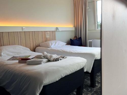 Habitación Doble - 2 camas del hotel IBIS RENNES CESSON. Foto 8