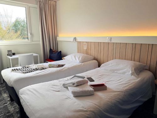Habitación Doble - 2 camas del hotel IBIS RENNES CESSON. Foto 9