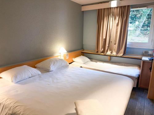 Habitación Estándar - 1 cama doble y 1 individual del hotel IBIS RENNES CESSON. Foto 6