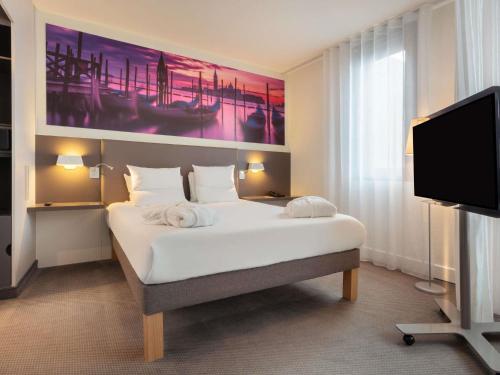 Suite Executive con sofá cama - 1 cama doble del hotel Novotel Suites Paris CDG Airport Villepinte. Foto 13