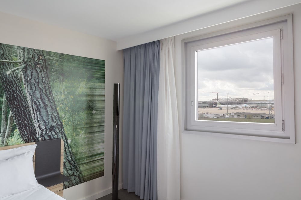 Habitación superior, 1 cama doble con sofá cama del hotel Novotel Paris Charles de Gaulle Airport