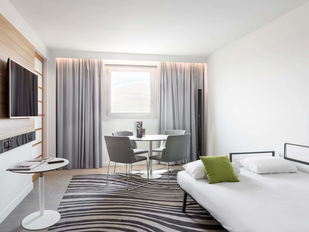 Suite, 1 cama doble del hotel Novotel Paris Charles de Gaulle Airport. Foto 5