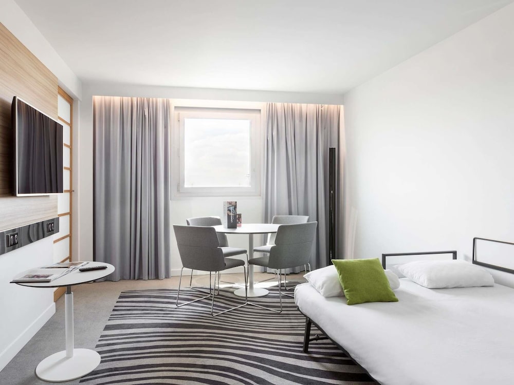 Suite, 1 cama doble del hotel Novotel Paris Charles de Gaulle Airport. Foto 11