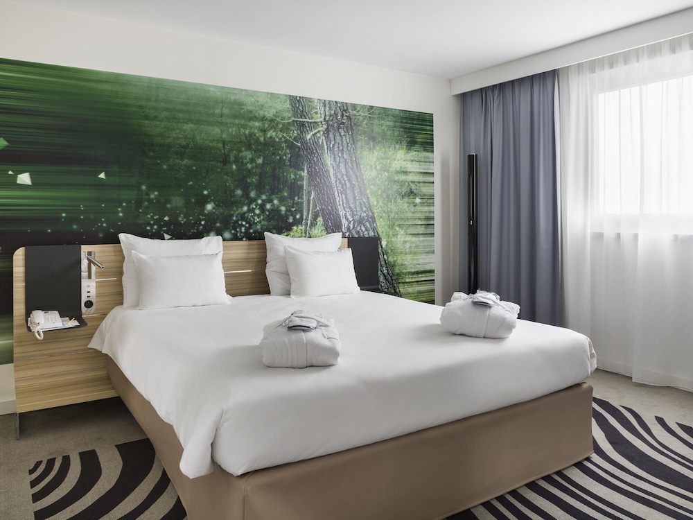 Suite, 1 cama doble del hotel Novotel Paris Charles de Gaulle Airport. Foto 12
