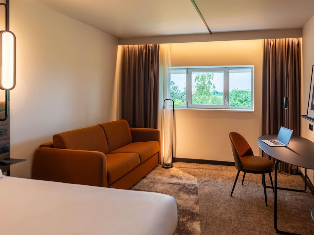 Habitación Deluxe con 1 cama doble, vistas al campo de golf del hotel Novotel Saint-quentin En Yvelines. Foto 1