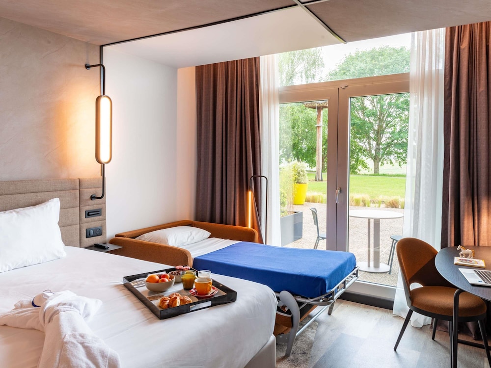 Habitación Deluxe con 1 cama doble, vistas al campo de golf del hotel Novotel Saint-quentin En Yvelines. Foto 5