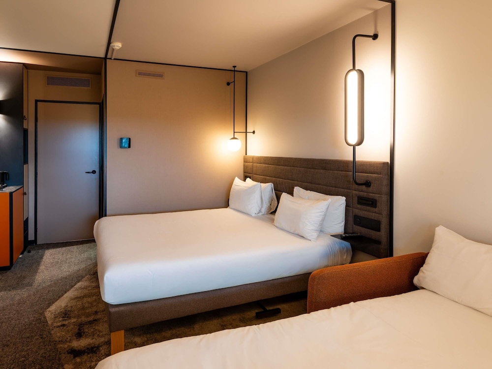 Habitación Superior con 1 cama doble y 1 sofá - cama pequeño o un sofá - cama del hotel Novotel Saint-quentin En Yvelines