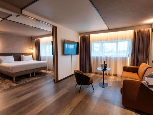 Suite, vistas al campo de golf - 1 cama King size del hotel Novotel Saint-quentin En Yvelines. Foto 6