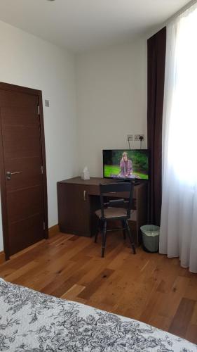 Habitación Triple Deluxe del hotel OYO The Kilburn Arms. Foto 12