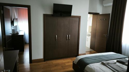 Habitación Familiar Deluxe del hotel OYO The Kilburn Arms. Foto 6