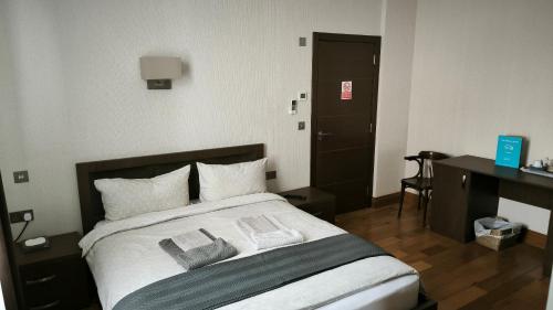 Habitación Familiar Deluxe del hotel OYO The Kilburn Arms. Foto 7