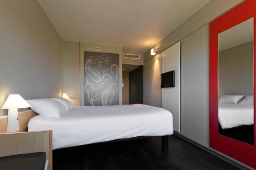 Habitación Doble Estándar del hotel Ibis Saint Dizier. Foto 3