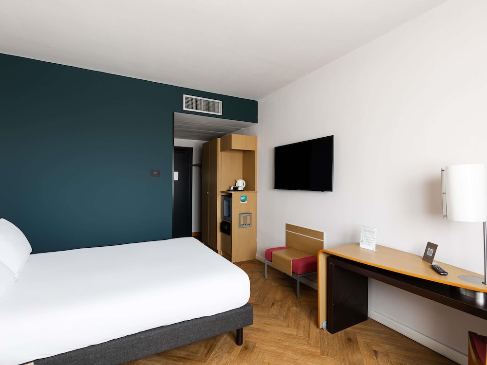 Habitación estándar, 1 cama de matrimonio grande del hotel Novotel Caserta Sud. Foto 11