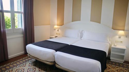 Habitación Doble del hotel 1881 Balneari Vichy Catalan. Foto 1
