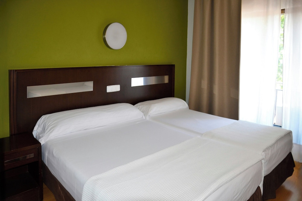 Habitación Triple del hotel Las Estrellas. Foto 1